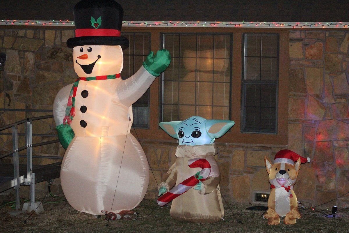 LIGHT BRIGHT: Some local homes decked out in holiday array have stories behind them